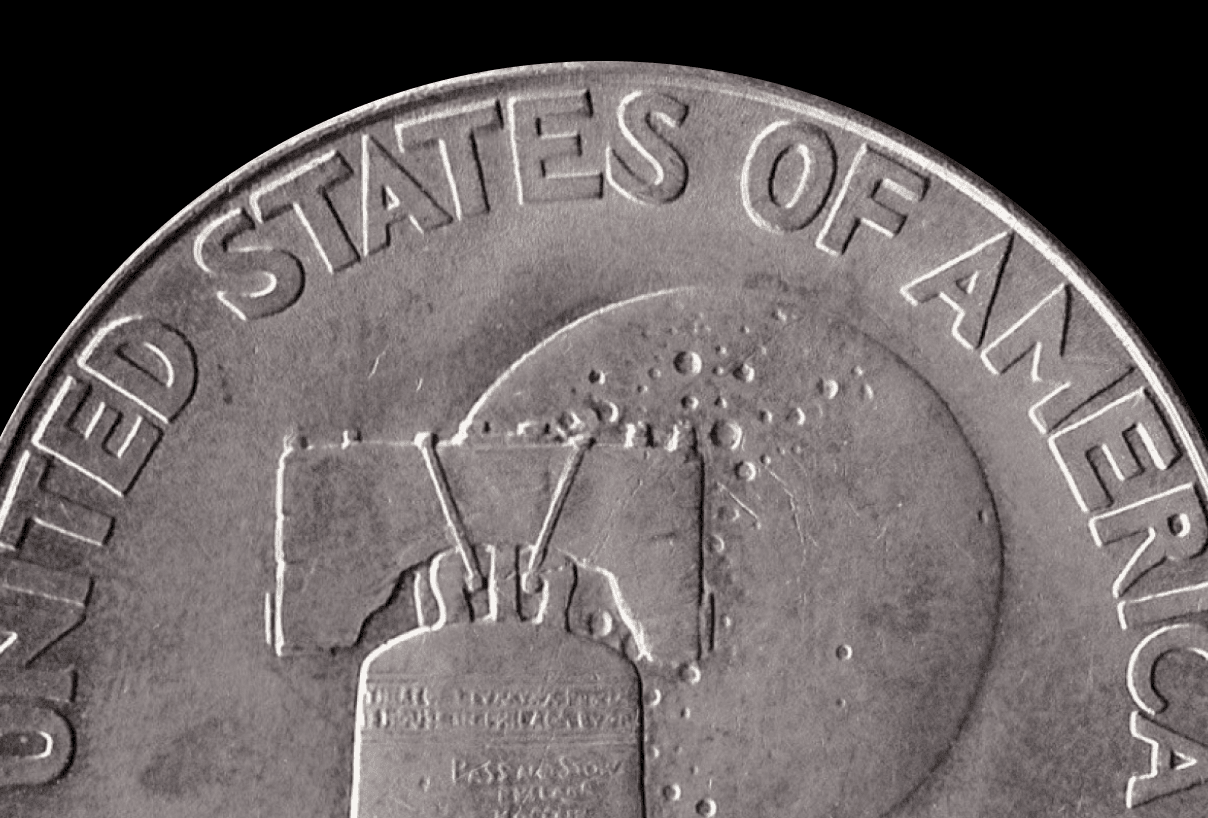 The image is a close-up view of the reverse side of a U.S. coin. The visible part of the coin includes the words "UNITED STATES OF AMERICA" around the top edge. Below the text, the Liberty Bell is prominently featured in the center of the design. Behind the Liberty Bell, there is an impression of the moon with various craters, symbolizing the Apollo 11 mission. The combination of the Liberty Bell and the moon represents the Bicentennial celebration, blending American independence and the space achievement. This coin is likely part of the 1976 Bicentennial series.