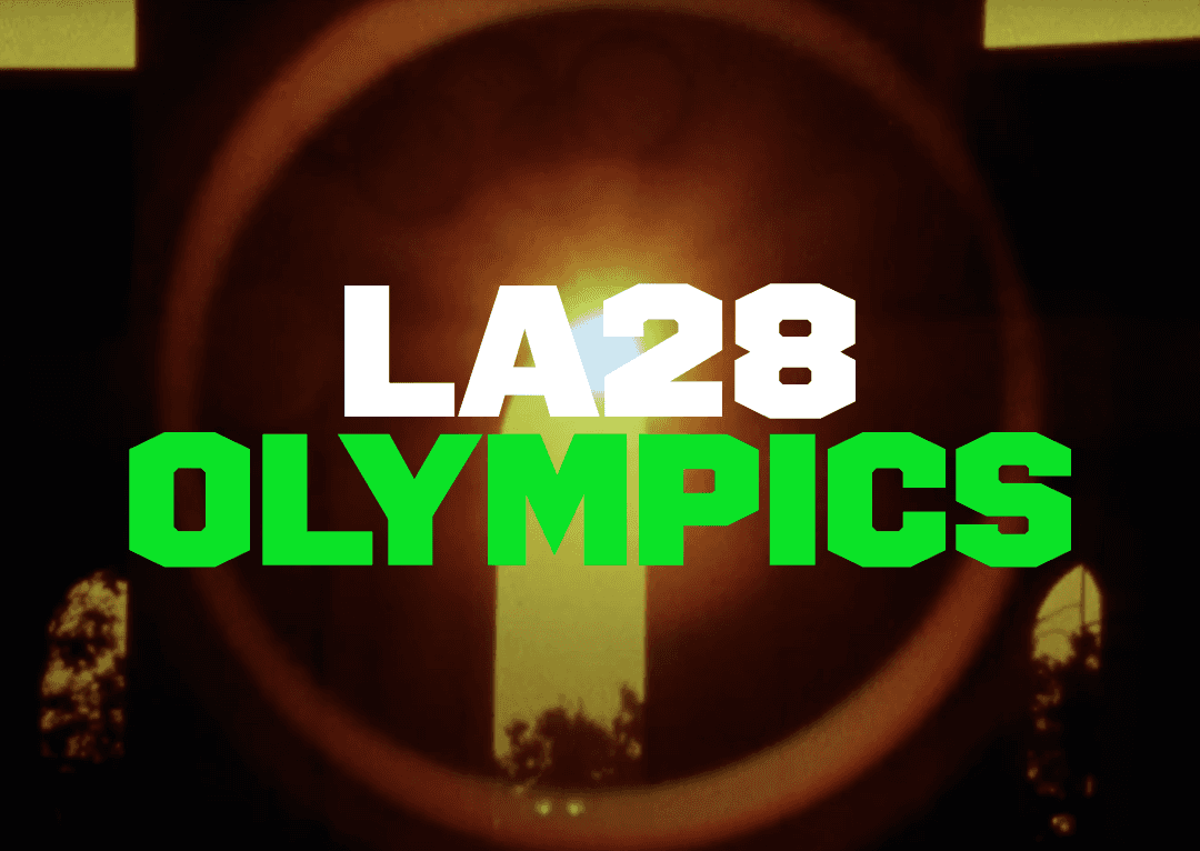 LA Olympic Memorial stadium in background with lens flare and LA28 Olympics custom typeface by by MCKL / Jeremy Mickel.